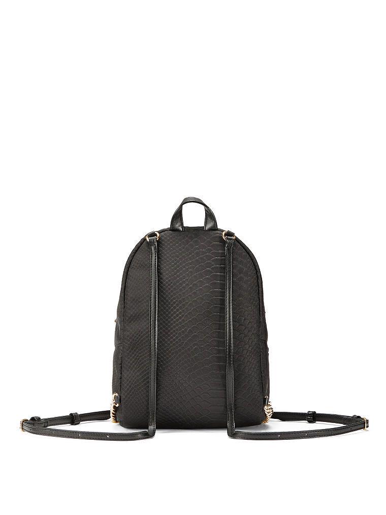 VS python stud Small City Backpack (Category: Bags & Wallets) located in Singapore. Submitted by saladcwa (Listing ID 184153993, Image 3). Description: Product Details New York, Paris, London—and beyond! This urban-inspired backpack is sized just right for all your city essentials. Main pocket fits: Wallet, phone and smaller daily essentials Small front zip pocket fits: Lip gloss and card case 1 interior multi-purpose pocket 7.3"L x 3.8"W x 9.7"H