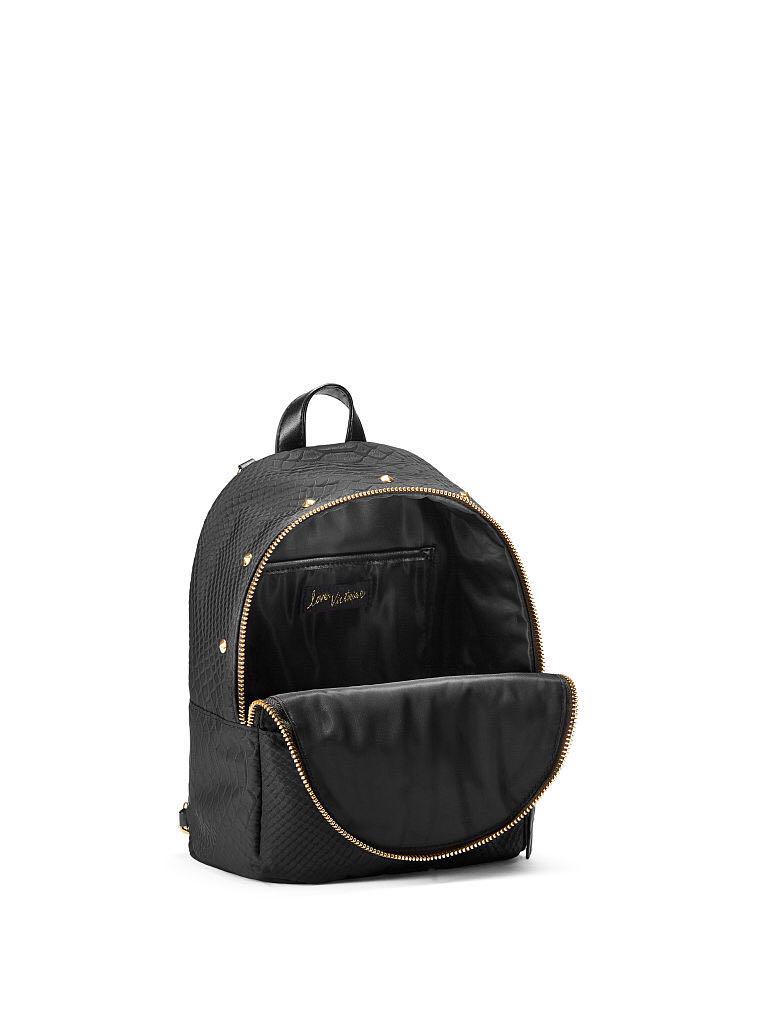 VS python stud Small City Backpack (Category: Bags & Wallets) located in Singapore. Submitted by saladcwa (Listing ID 184153993, Image 2). Description: Product Details New York, Paris, London—and beyond! This urban-inspired backpack is sized just right for all your city essentials. Main pocket fits: Wallet, phone and smaller daily essentials Small front zip pocket fits: Lip gloss and card case 1 interior multi-purpose pocket 7.3"L x 3.8"W x 9.7"H