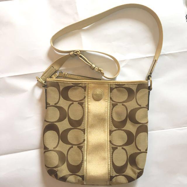 Coach canvas sling bag sales
