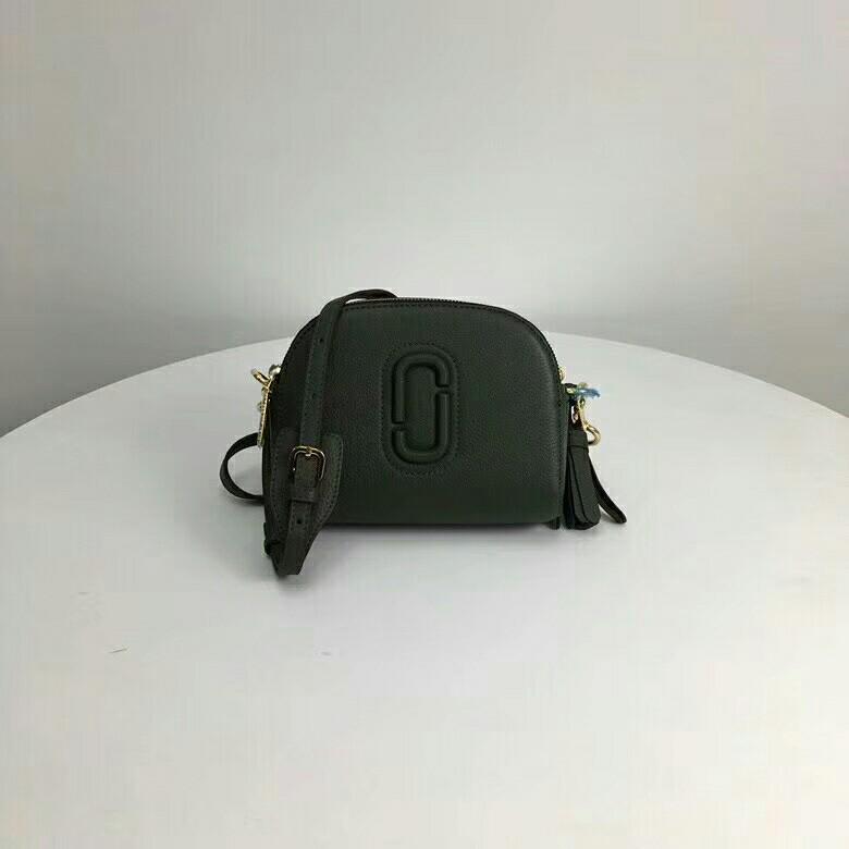 dark green sling bag