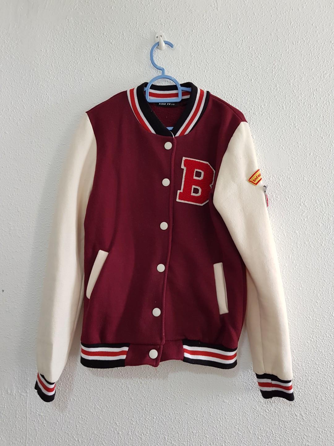 maroon and white varsity jacket