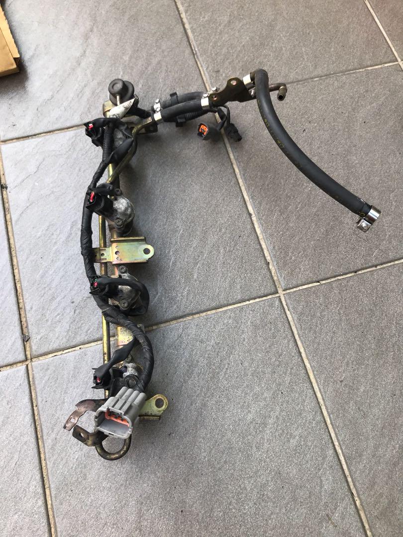 Stock Nissan Sr20det fuel rail with stock injectors, Car Accessories, Accessories on Carousell
