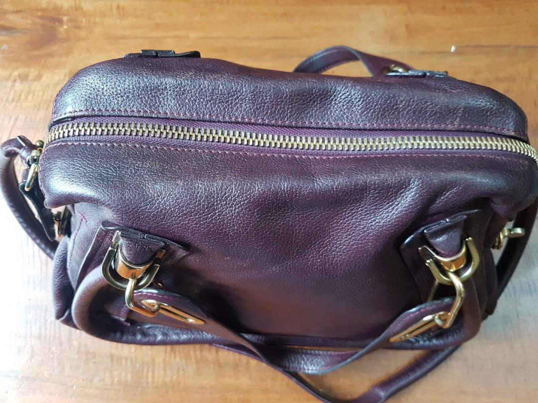 Chloe Paraty (Category: Luxury Bags & Wallets) located in Manila. Submitted by maya_ph (Listing ID 184432836, Image 3). Description: Repriced!! Sale or swap Chloe Paraty medium in rare eggplant color No notable flaws, just sign of use. It has slight tarnishing on some of the hardware, a polishing would make wonders. Also, discoloration on the top part of the leather. No more cards but in its original dustbag This is an everyday bag where you can 