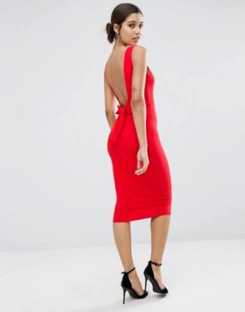 Kisses and Company (Category: Traditional & Ethnic wear) located in Manila. Submitted by maya_ph (Listing ID 158656493, Image 1). Description: The red dress! Great for evening cocktails and nightouts with friends or beau Low back, with bow details and form fitting Used once during event, stored and forgotten In excellent used condition.