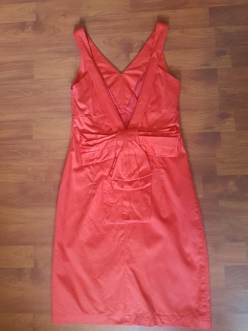 Kisses and Company (Category: Traditional & Ethnic wear) located in Manila. Submitted by maya_ph (Listing ID 158656493, Image 2). Description: The red dress! Great for evening cocktails and nightouts with friends or beau Low back, with bow details and form fitting Used once during event, stored and forgotten In excellent used condition.