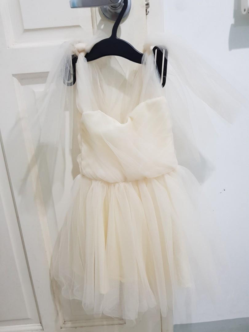 Tie-shoulder Tulle Dress (Category: Babies & Kids Fashion) located in Pasig City. Submitted by kathrinas (Listing ID 184276300, Image 2). Description: Used once for a flower girl stint. Original priced at 1400. Shoulder to shoulder: 8.6 Chest: 19 Wait: 19 Hips: 20.5 Armhole: 9 Armlength : 9.5 Waist to length: 11 Shoulder to waist: 6.5.