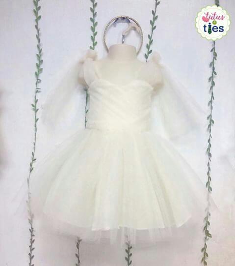 Tie-shoulder Tulle Dress (Category: Babies & Kids Fashion) located in Pasig City. Submitted by kathrinas (Listing ID 184276300, Image 1). Description: Used once for a flower girl stint. Original priced at 1400. Shoulder to shoulder: 8.6 Chest: 19 Wait: 19 Hips: 20.5 Armhole: 9 Armlength : 9.5 Waist to length: 11 Shoulder to waist: 6.5.
