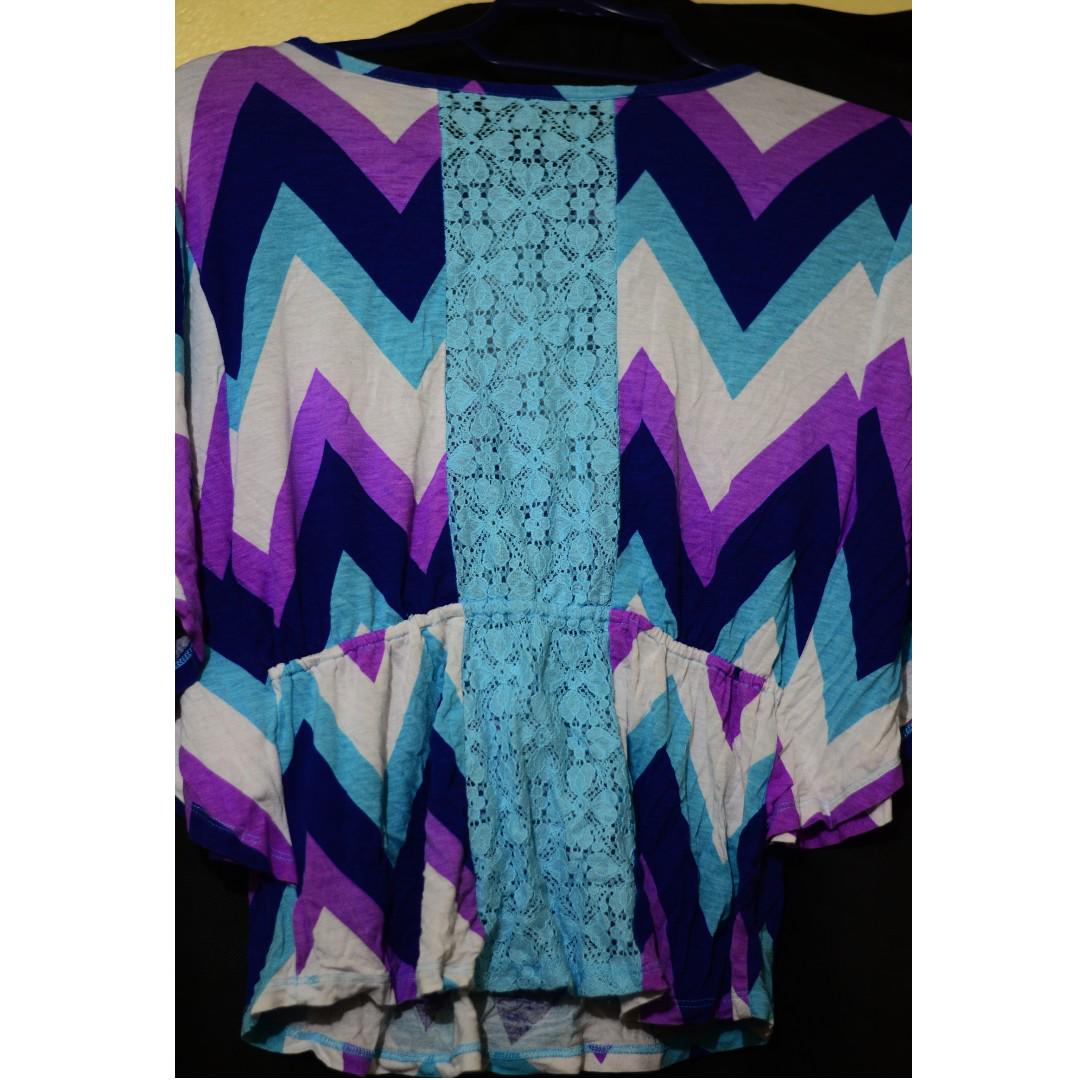 [SALE] zigzag-patterned blouse! (Category: Blouses) located in Makati City. Submitted by shunkerry (Listing ID 184529802, Image 2). Description: (SALE — FINAL PRICE) Hi! I'm selling this colorful blouse with a zigzag pattern! I don't know what this style of blouse is called but it does have a cinched waist and flowy sleeves! Photo #2 shows the back of the blouse, which has a light blue lace panel in the middle~ The size shown in photo #3 is actua