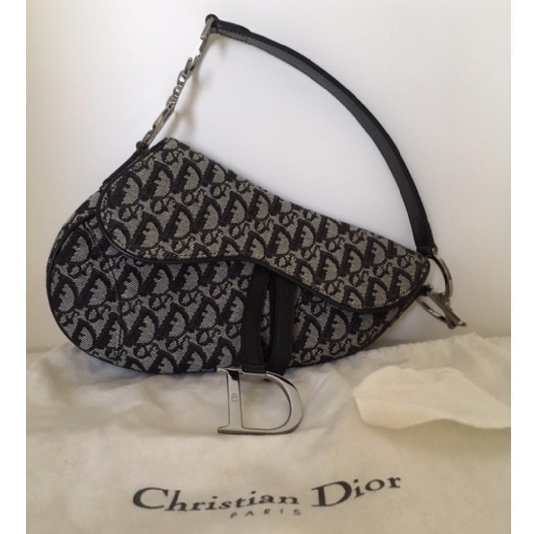 Dior Oblique Jacquard Saddle Pouch Beige and Black, Luxury, Bags & Wallets  on Carousell