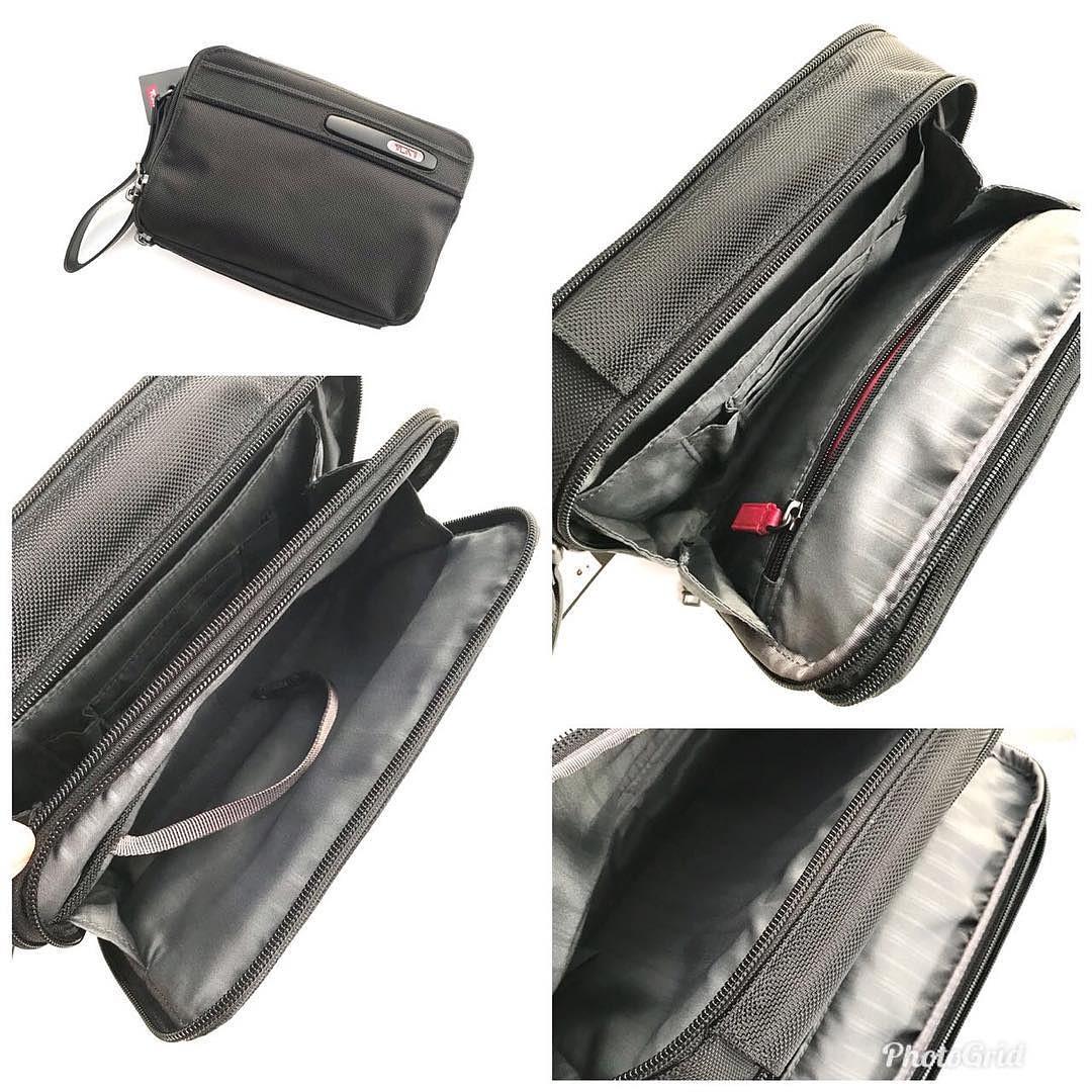 tumi business clutch