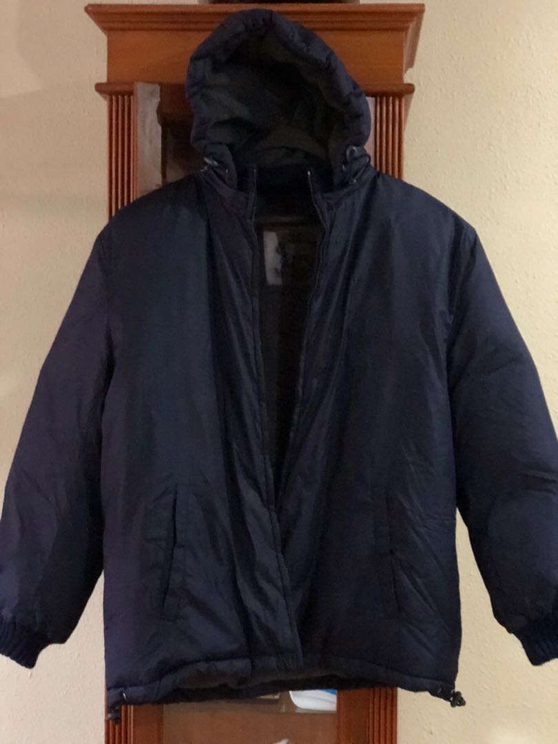 Winter down jacket (Category: Coats, Jackets and Outerwear) located in Singapore. Submitted by binteabd (Listing ID 184633897, Image 1). Description: Selling a preloved dark blue down jacket from Winter Time. Condition 9/10. Selling cos it doesn’t fit my Daughter. Information as in the pictures. Measurements : Sleeve - 54cm Shoulder - 48cm Width (straight) - 57cm Length - 64cm.