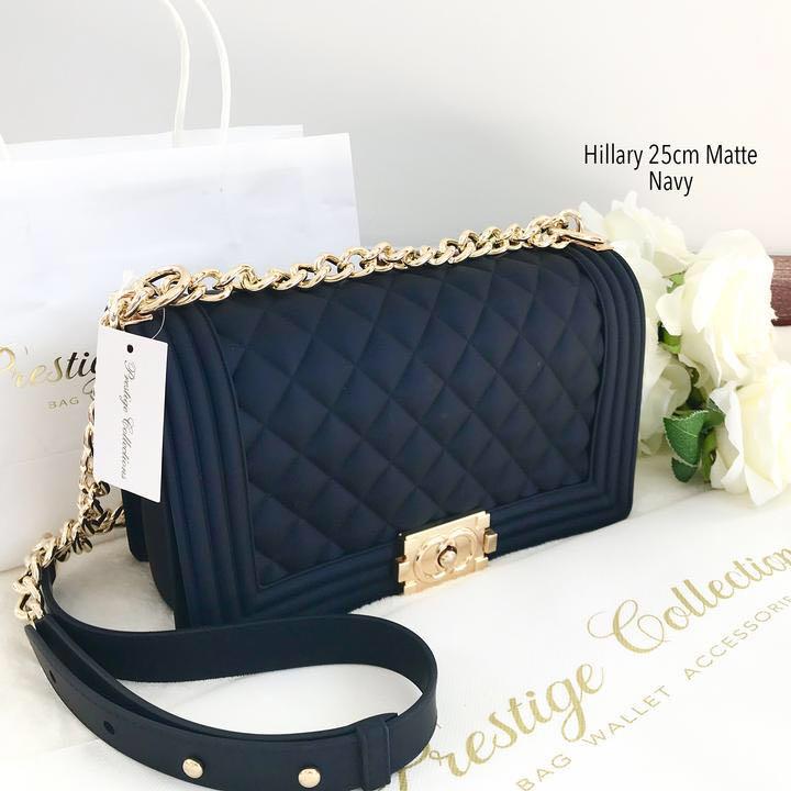 Hillary Matte Bag 25cm (Category: Beach Bags) located in Quezon City. Submitted by everythingnewph (Listing ID 183407066, Image 3). Description: Details: made of high quality ecofriendly Jelly material original material heavy and sturdy, non fading, and thick material push lock closure with gold and non-tarnish embellishments with adjustable sling strap upgraded to make it lighter for easier use Dimension: 25*9*15cm Weight: 1.02kg.