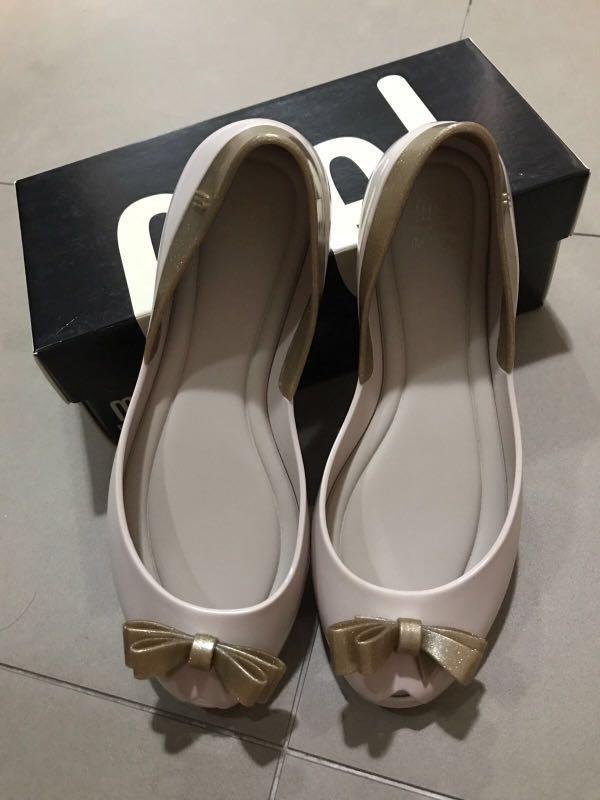 Melissa Shoes in cream and black price for 2 pairs Women s Fashion Footwear Flipflops and Slides on Carousell