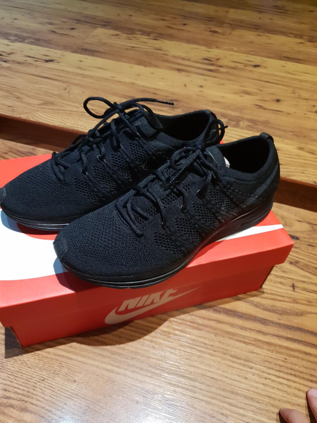 flyknit trainer triple black