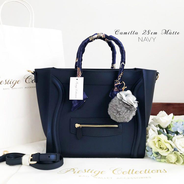 Camilla Handbag Slingbag Navy Blue (Category: Cross-body Bags) located in Quezon City. Submitted by everythingnewph (Listing ID 183034890, Image 2). Description: Details: FREEBIES: adjustable sling and plain dustbag made of high quality and ecofriendly Jelly material original material heavy and sturdy, non fading, and thick material zippered closure with gold and non-tarnish embellishments with adjustable and detachable sling Dimension: 28*25*9cm