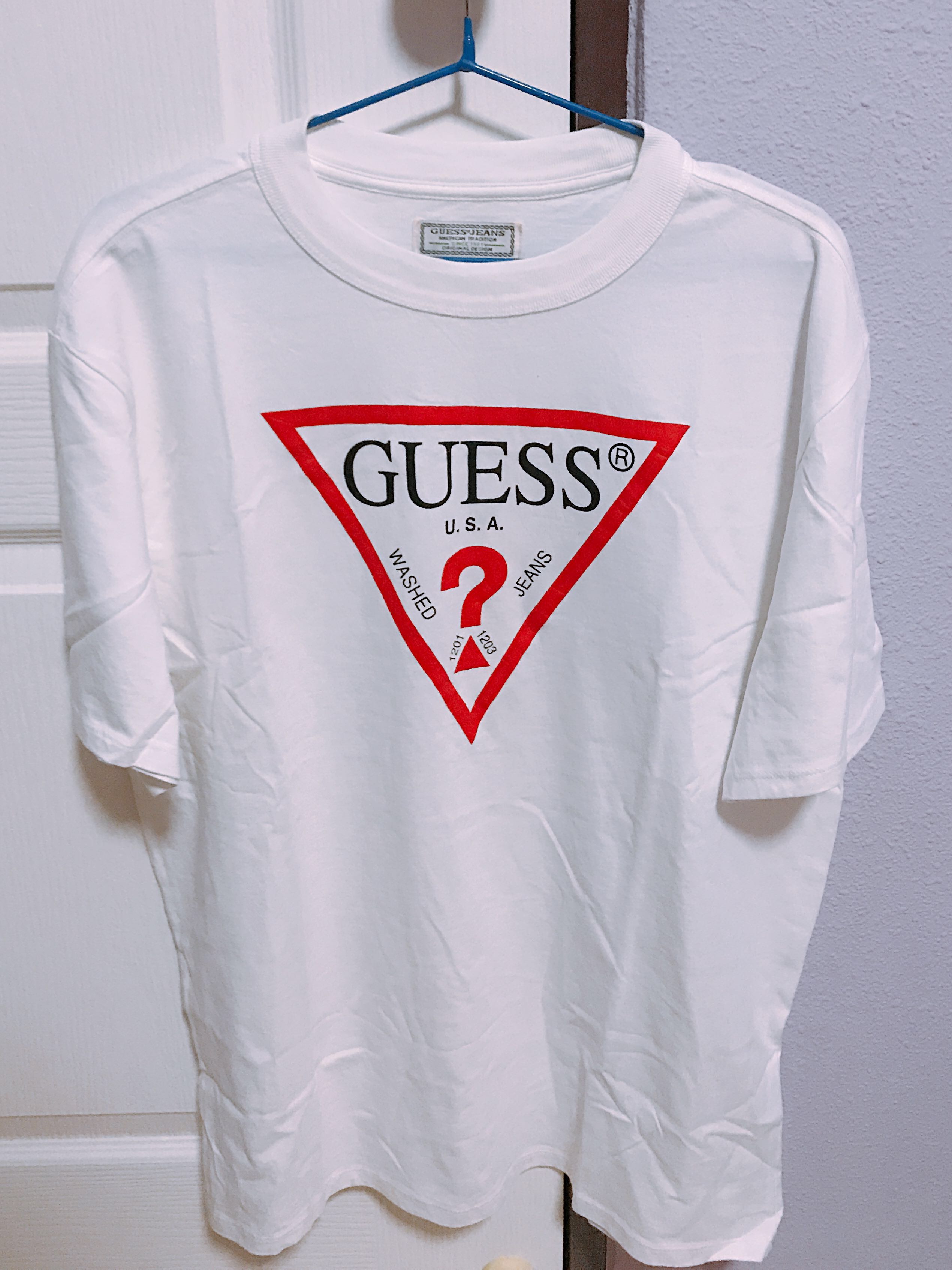 GUESS triangle logo tee, Luxury, Apparel on Carousell