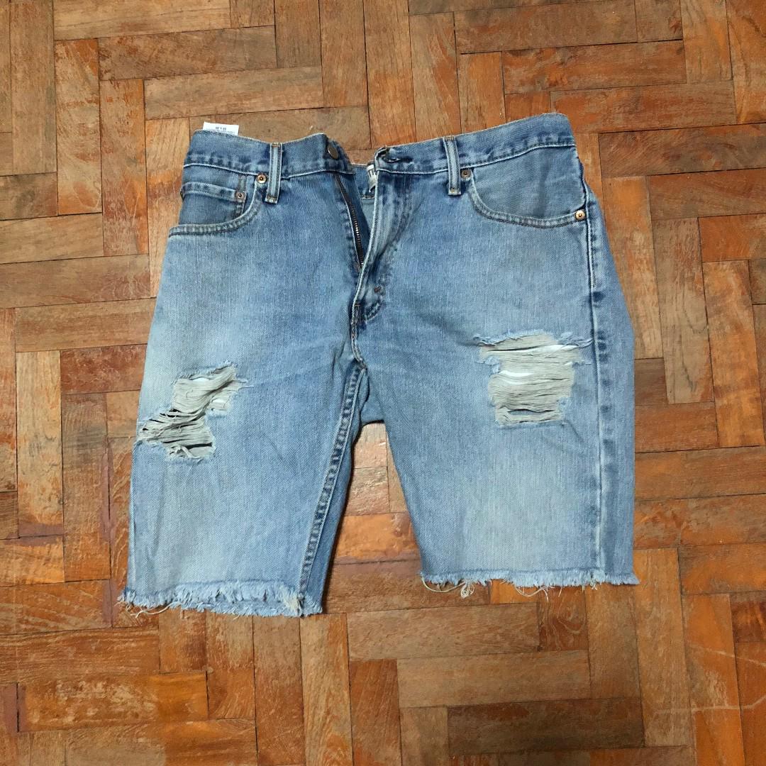 Levis short denim ripped jeans, Men's Fashion, Bottoms, Jeans on Carousell
