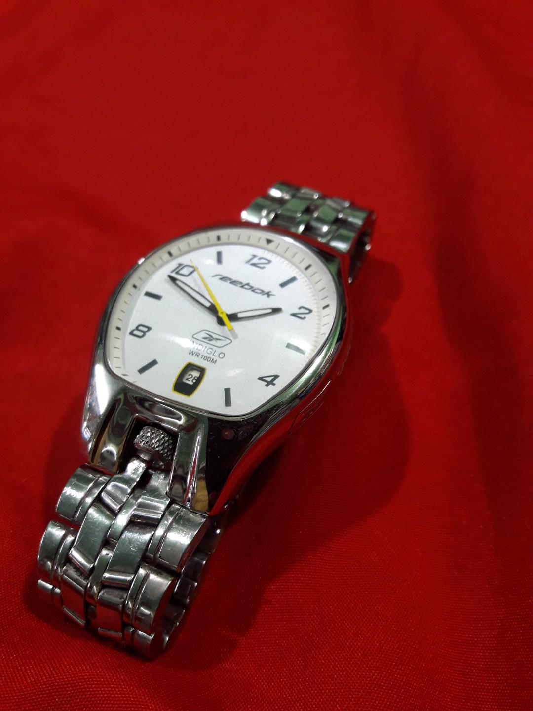 REEBOK WATCH (Category: Men's Watches) located in Manila. Submitted by thegreat. (Listing ID 184923074, Image 2). Description: YES IT IS ORIGINAL REEBOK WATCH WHITE DISPLAY DIAL WITH DATE @ 6 O' CLOCK POSITION STAINLESS STEEL BEZEL GOOD RUNNING CONDITION DOME GLASS UNIQUE DESIGN WRIST SIZE 17 .5 CM.