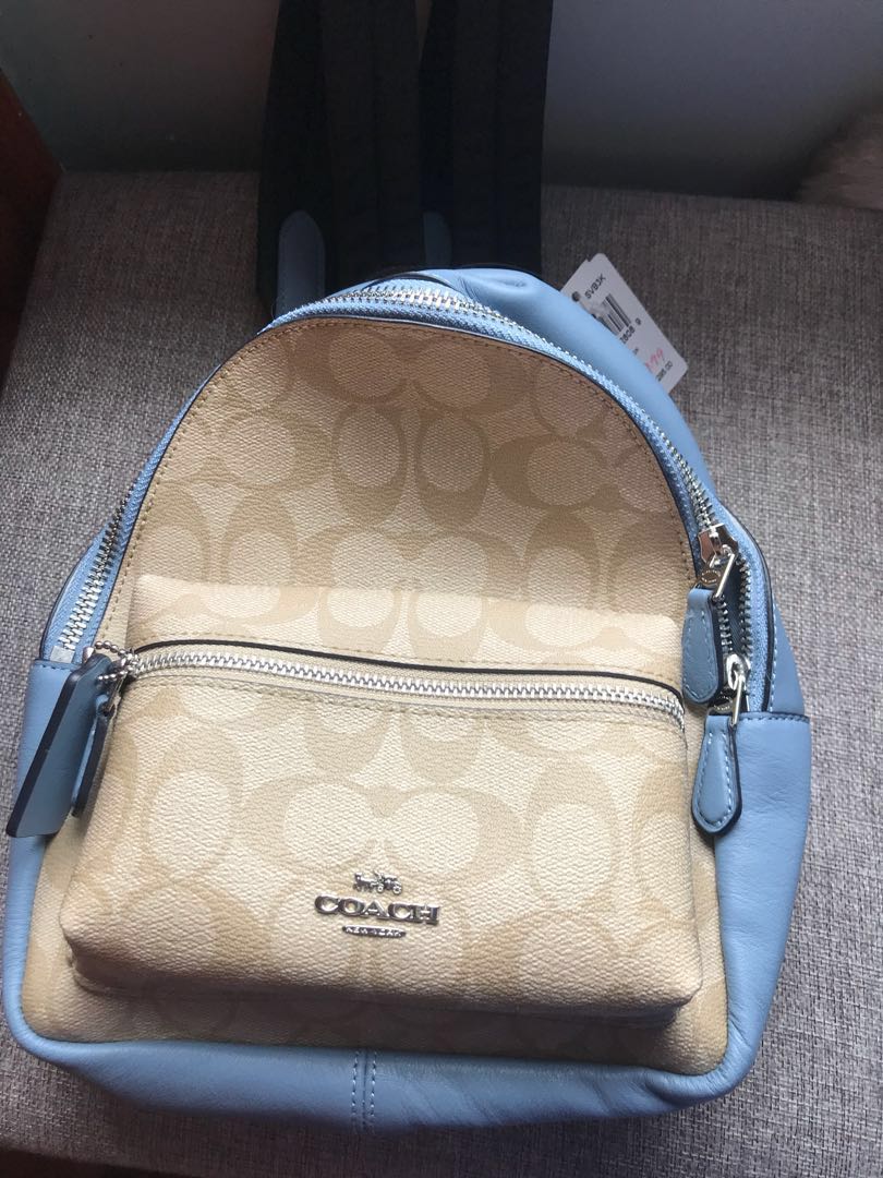 light blue coach backpack