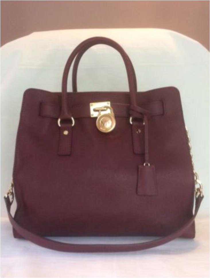 mk burgundy handbag