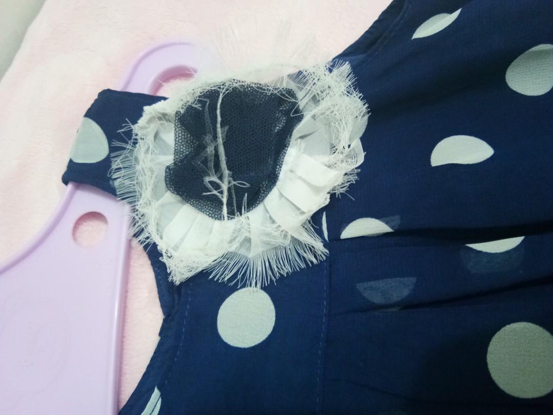 Polka dots dark blue dress (Category: Babies & Kids Fashion) located in Bulacan. Submitted by bundleofsofi (Listing ID 185338666, Image 2). Description: As seen on 2nd pic, the supposed to be flower like stuff is damaged. Other parts, it's all good..