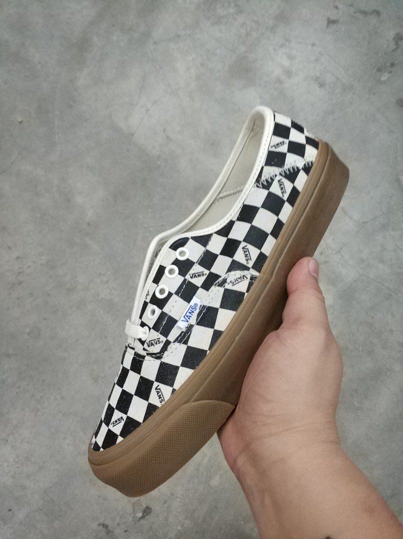 vans checkerboard slip on gum sole