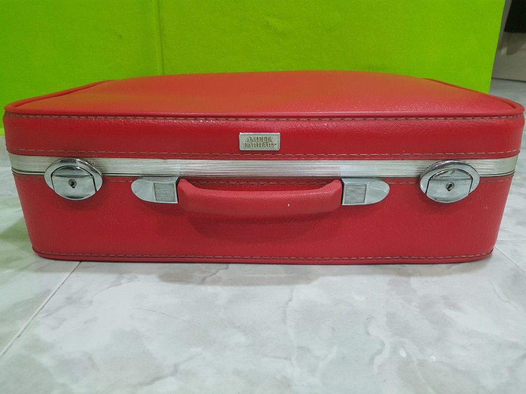 amelia earhart luggage red