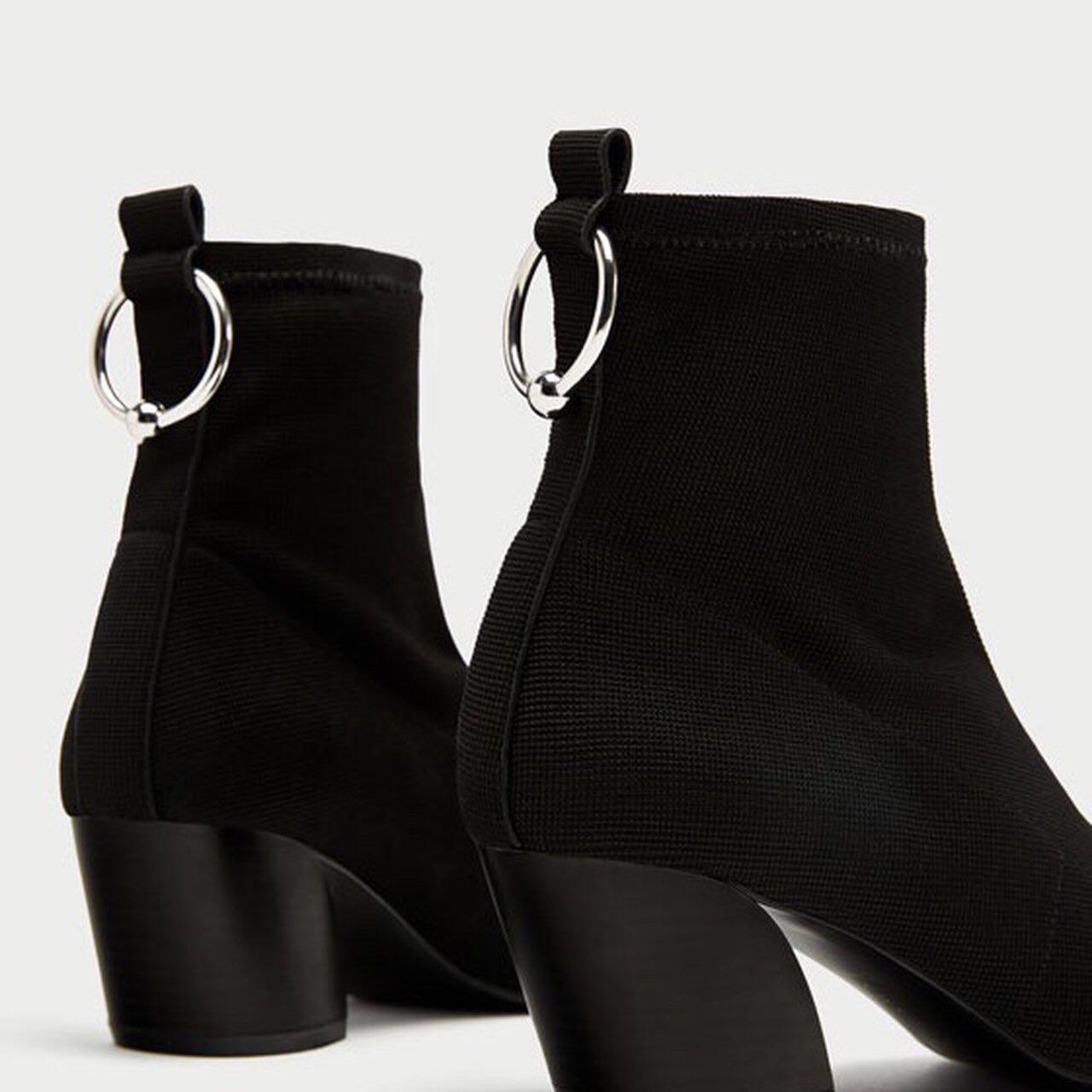 Black Zara sock boots with silver ring 
