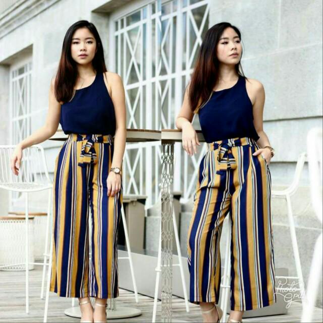 blue pants with yellow stripe