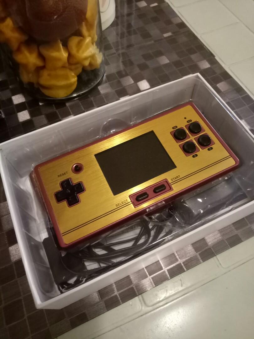 FC Pocket Game Console (Category: Others) located in Carmona. Submitted by genperf (Listing ID 185509943, Image 1). Description: Slightly used FC Compact Game Console, color maroon. Complete with controller, extra cartridge game, AV cord and case. Still in very good condition..