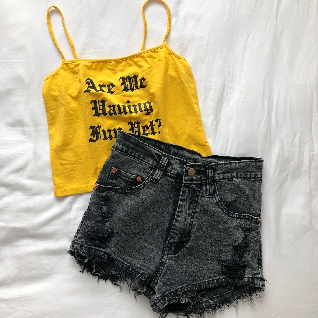 black and yellow ripped jeans
