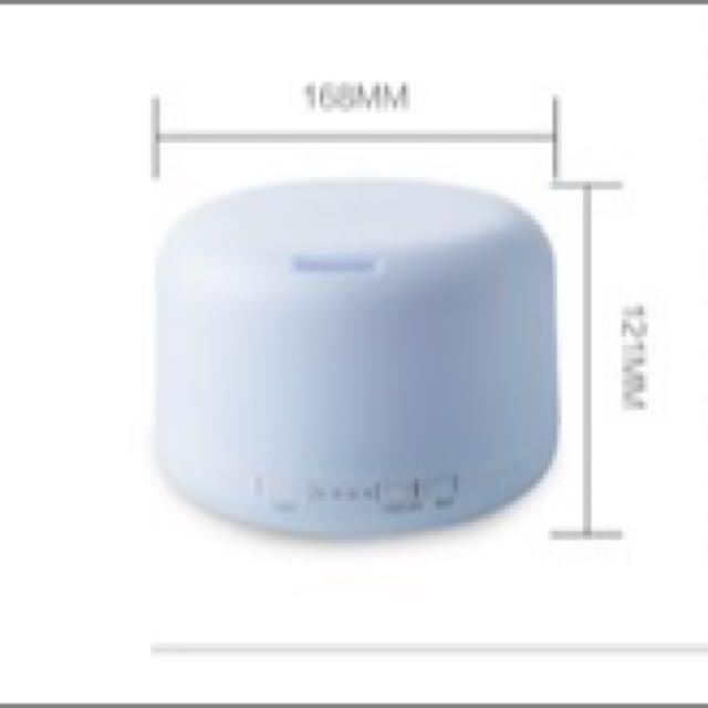 Humidifier / Mist Diffuser (Category: Air Conditioners & Heating) located in Singapore. Submitted by jnc_ng (Listing ID 82583392, Image 2). Description: ***** Humidifier / Mist Diffuser **** 🔥🔥CLEARANCE🔥🔥 Limited stock + FREE 2 bottle of essential oil (random) Functions: - Ultrasonic Humidifier - Aroma / Essential oil diffuser - Air Purifier - Nigh Light (7 light colours) – can select continuous or just one colour - Insect Repellent Other fea