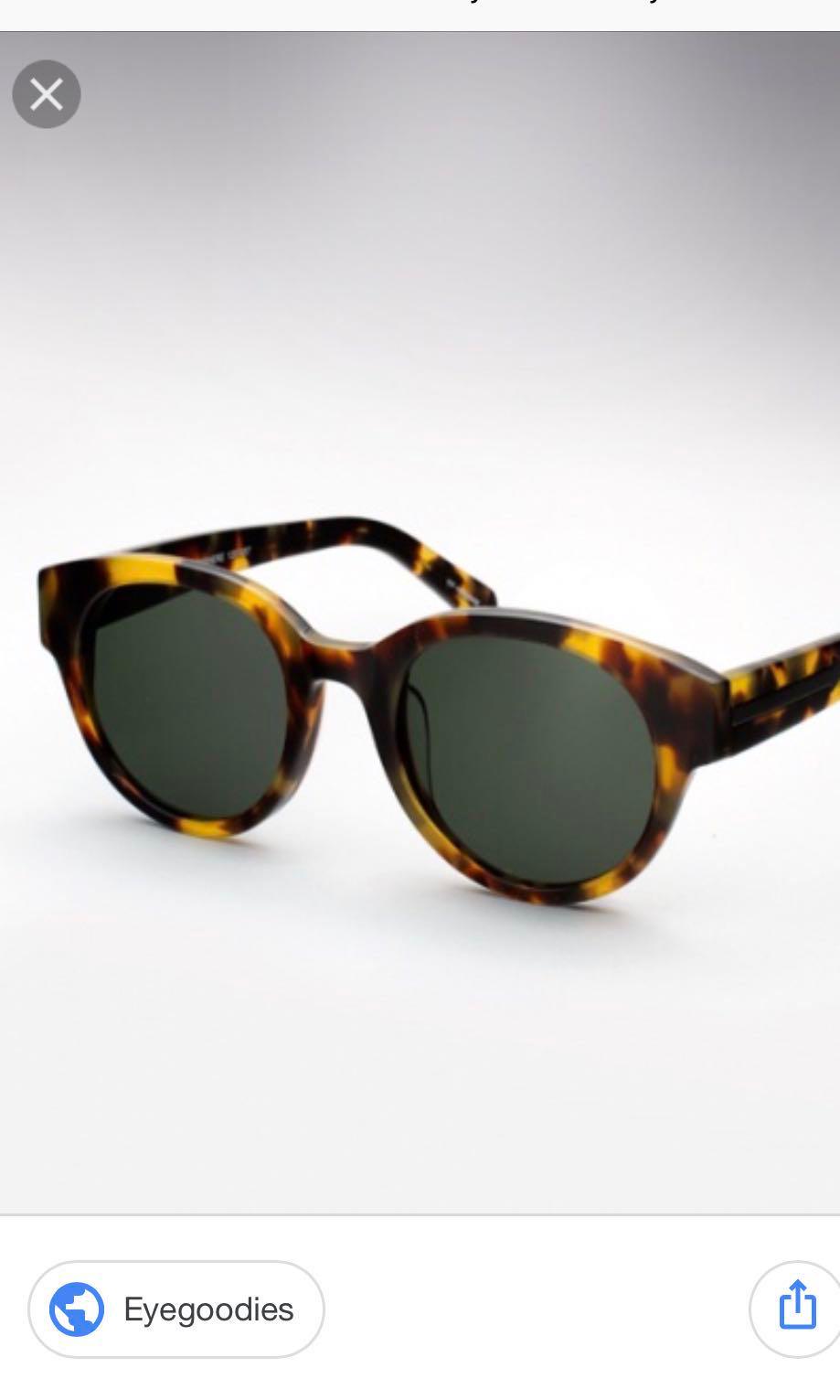 Karen Walker, a pair of orange glitter 