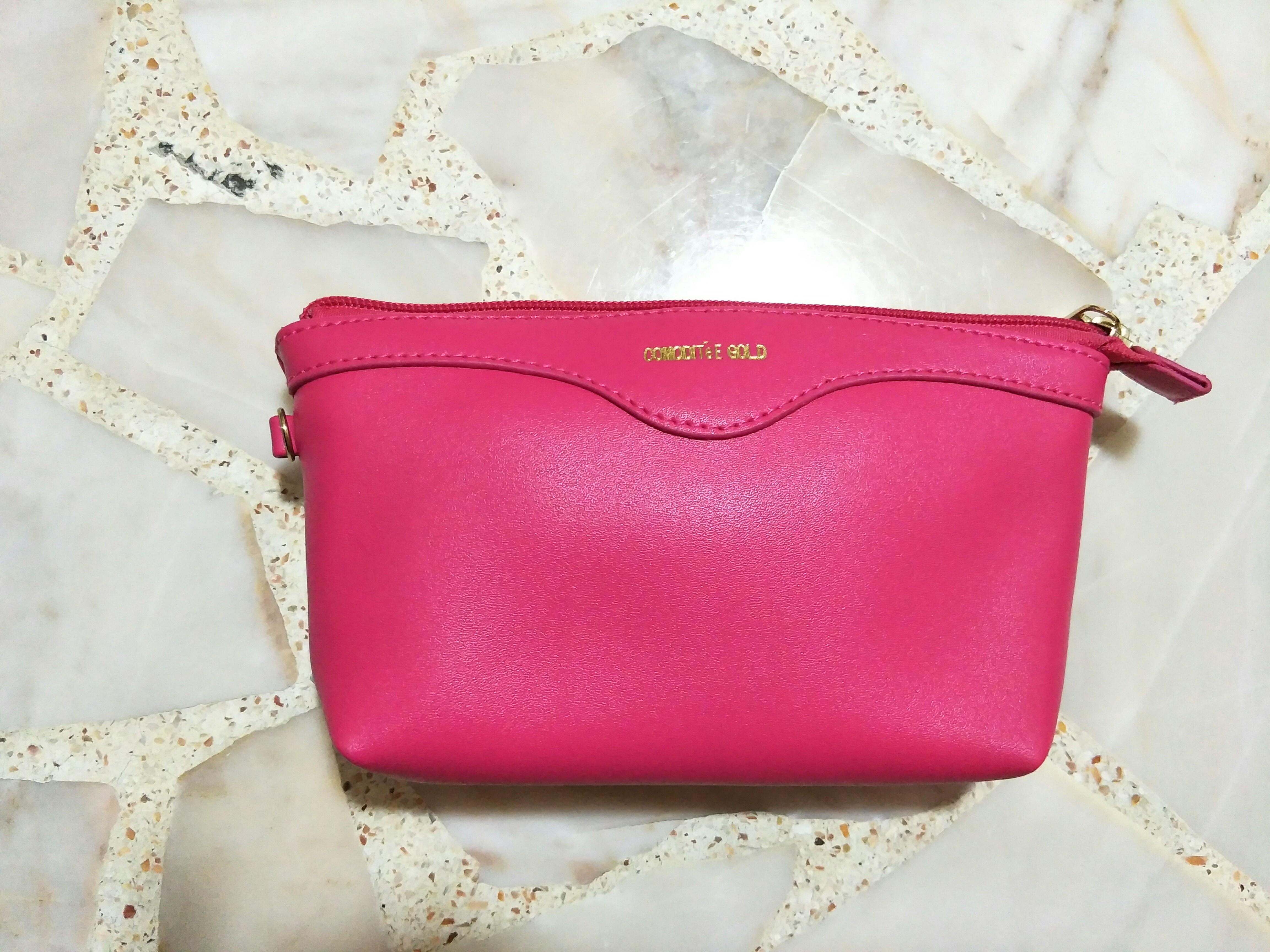 pink and gold clutch