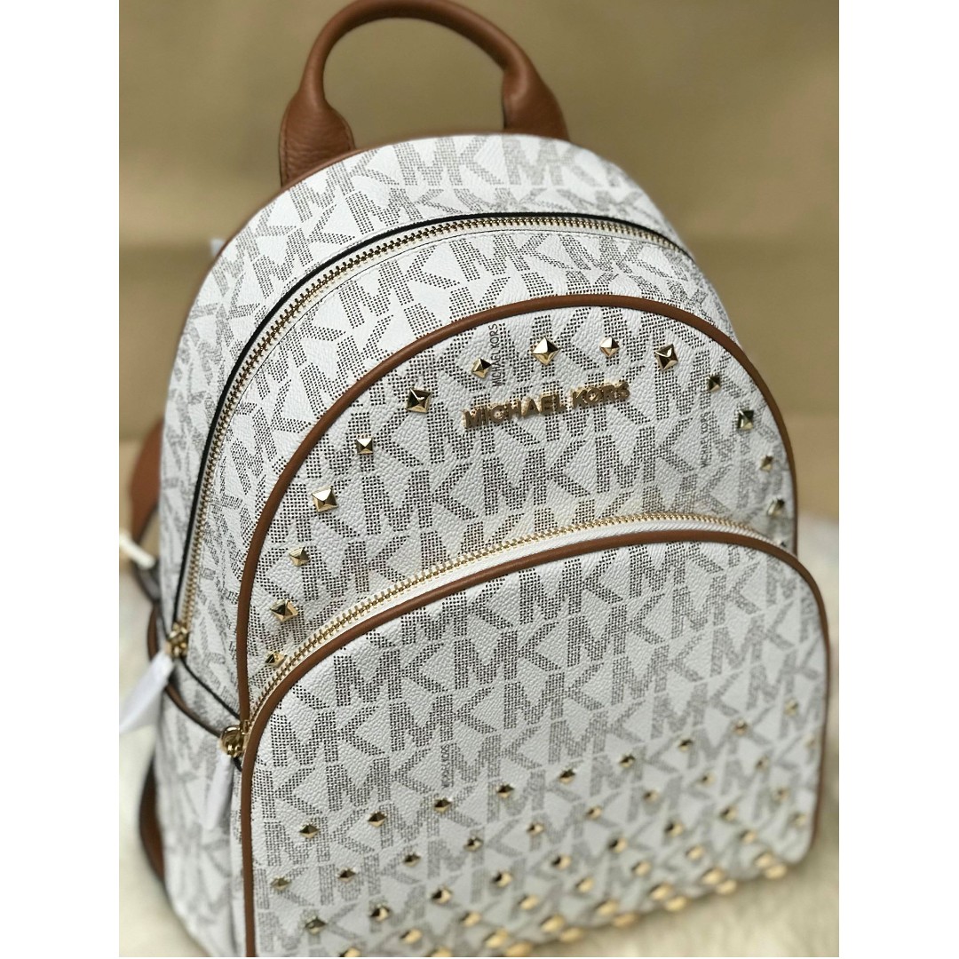 Michael kors Abbey Medium Studded Vanilla/Acorn Backpack, Women's Fashion,  Bags & Wallets, Backpacks on Carousell