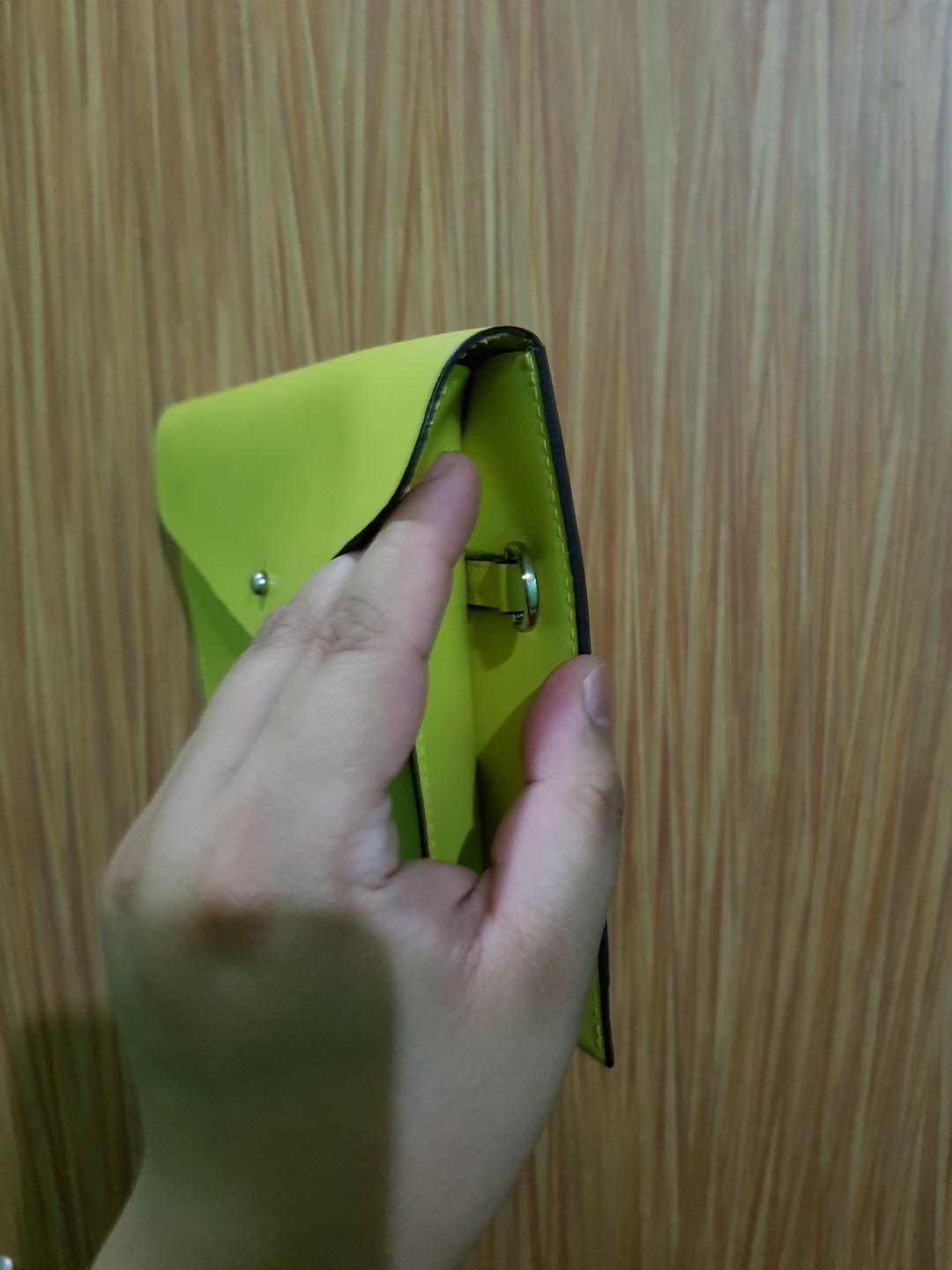 Fino leatherware (Category: Wallets & Card holders) located in Makati City. Submitted by destash2restash2018 (Listing ID 185940506, Image 3). Description: Envelope clutch (large) with hook attachment..