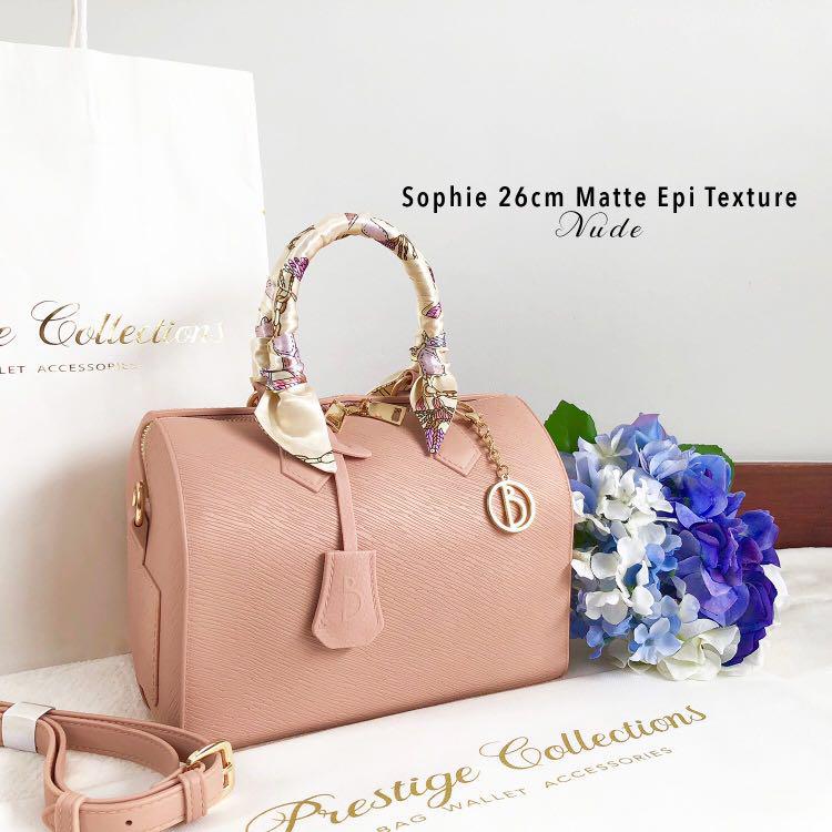 Sophie Speedy Bag Handbag Nude Matte (Category: Tote Bags) located in Quezon City. Submitted by everythingnewph (Listing ID 183203545, Image 2). Description: FREEBIES: Bag Tag, Adjustable sling, plain dustbag made of high quality and ecofriendly Jelly material epi texture original material heavy and sturdy, non fading, and thick material zipper closure that extends on the sides with gold and non-tarnish embellishments with detachable and adjustab