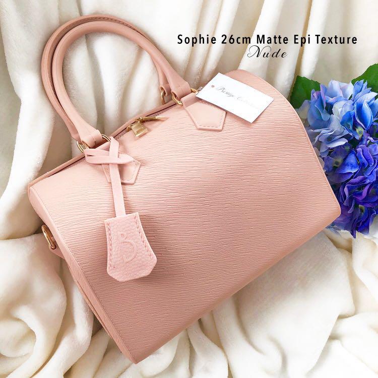Sophie Speedy Bag Handbag Nude Matte (Category: Tote Bags) located in Quezon City. Submitted by everythingnewph (Listing ID 183203545, Image 1). Description: FREEBIES: Bag Tag, Adjustable sling, plain dustbag made of high quality and ecofriendly Jelly material epi texture original material heavy and sturdy, non fading, and thick material zipper closure that extends on the sides with gold and non-tarnish embellishments with detachable and adjustab