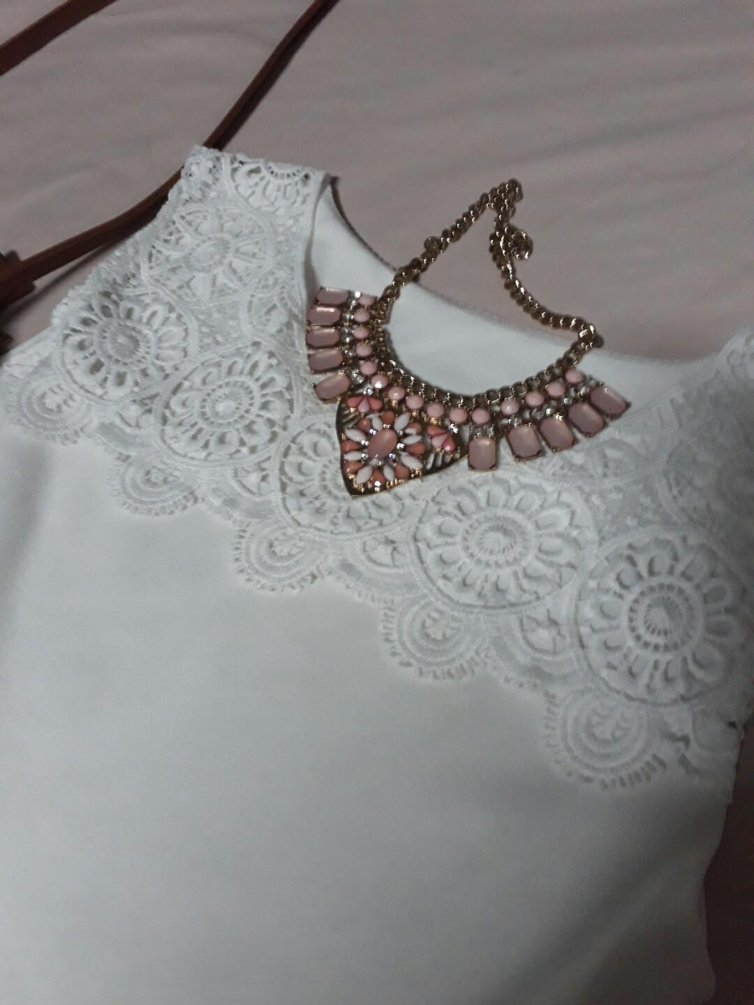 White dress with lace details (Category: Evening dresses & gowns) located in Taguig. Submitted by khaleexis (Listing ID 186200633, Image 1). Description: 🌟Used but not abused🌟 🌟Perfect for any occasion🌟 Accessories not included.