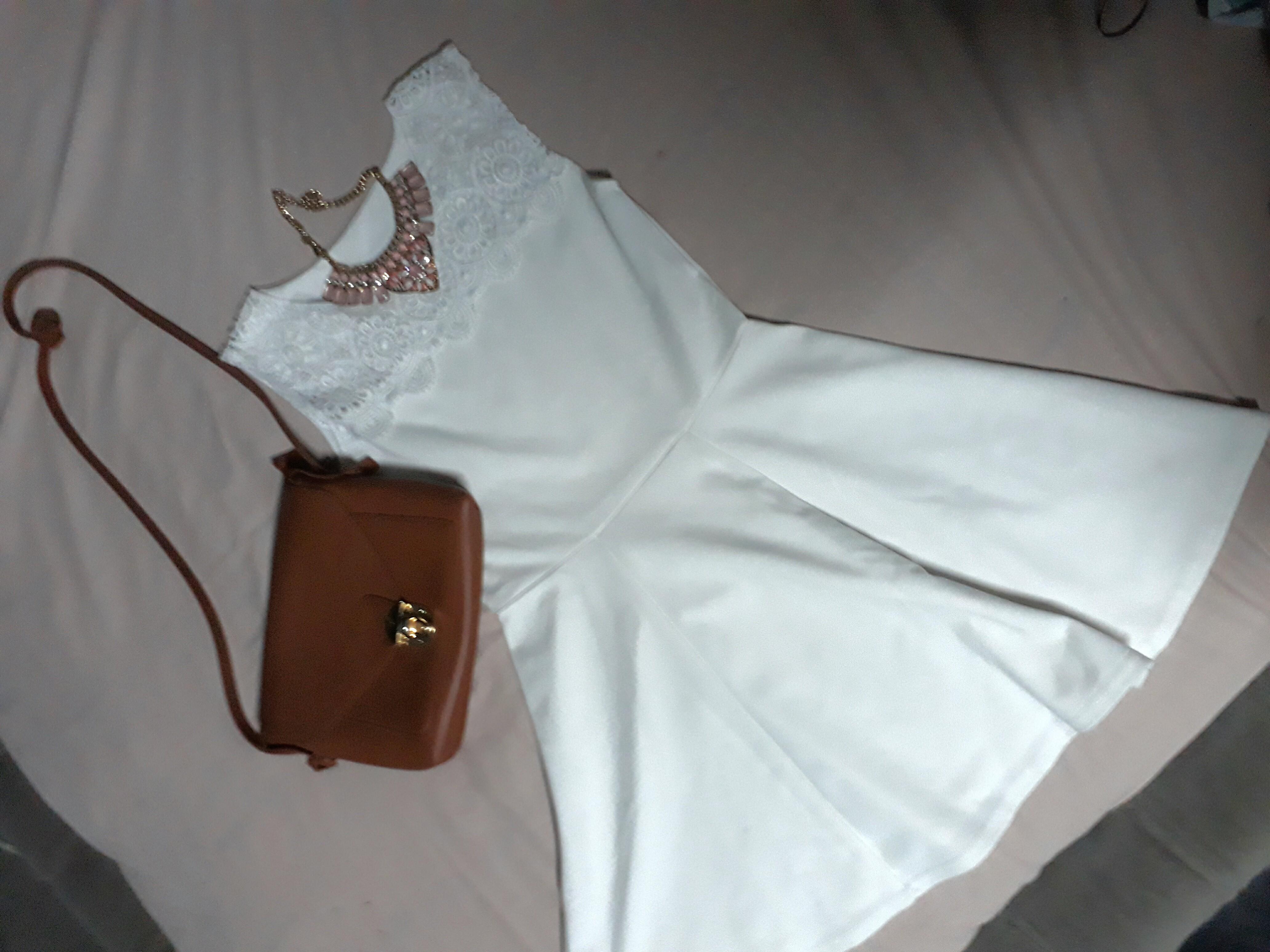 White dress with lace details (Category: Evening dresses & gowns) located in Taguig. Submitted by khaleexis (Listing ID 186200633, Image 3). Description: 🌟Used but not abused🌟 🌟Perfect for any occasion🌟 Accessories not included.