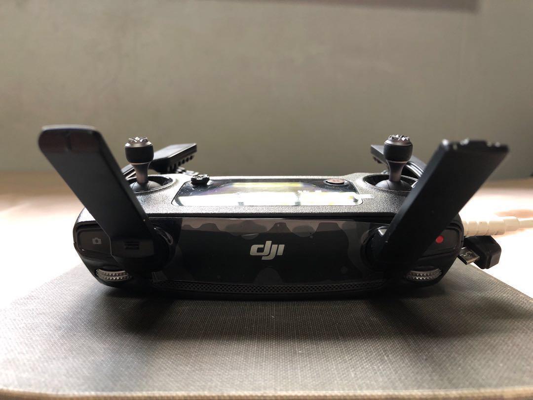 Mavic Pro Remote Controller (Category: Drones) located in Singapore. Submitted by eng713 (Listing ID 179865833, Image 2). Description: Got a new Mavic Pro. Do not need it anymore. Used less than 5 times. Well maintained. Screen protectors still on. Condition 9/10.