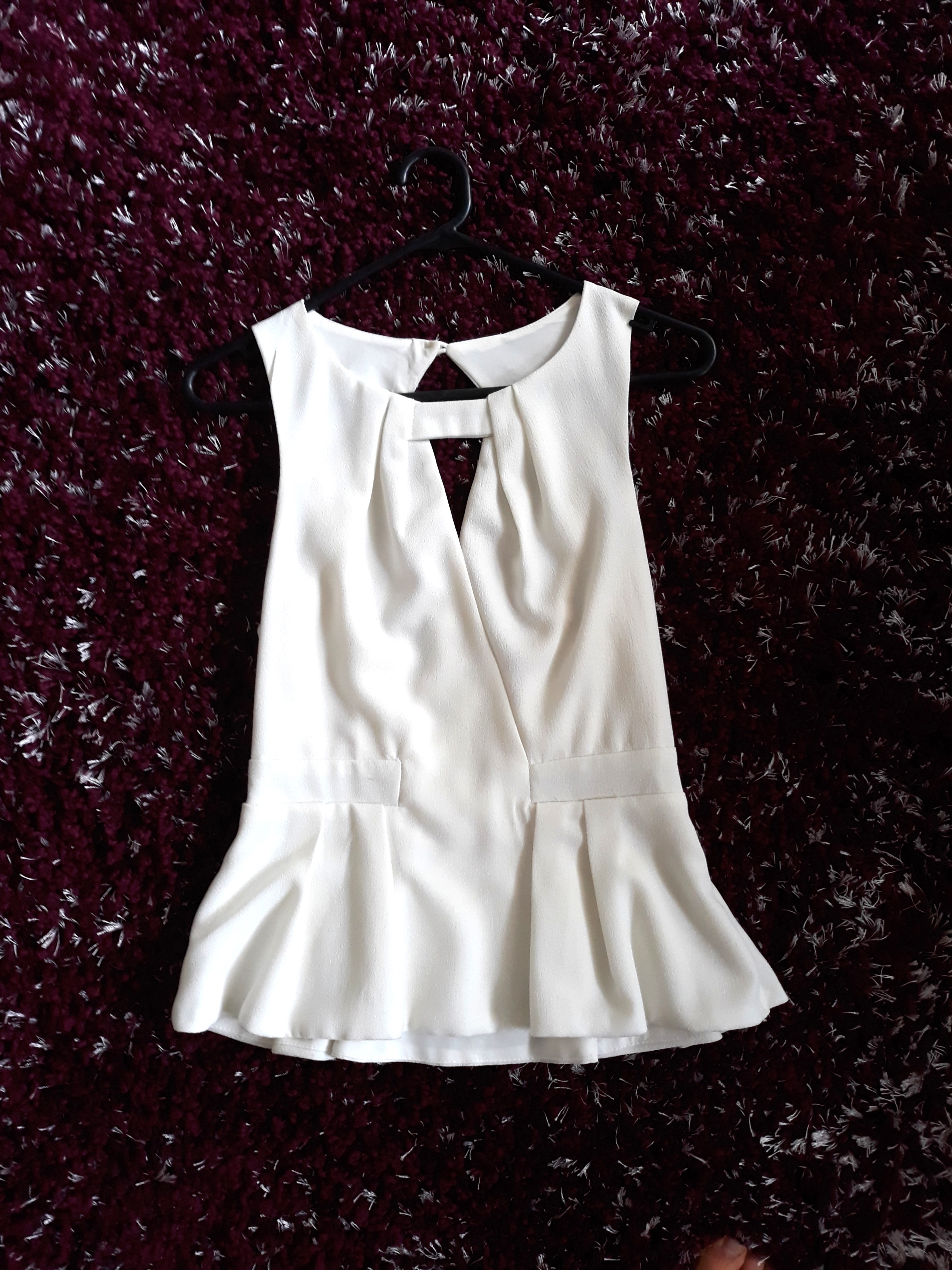 White peplum top from iconic, Women's Fashion, Clothes on Carousell