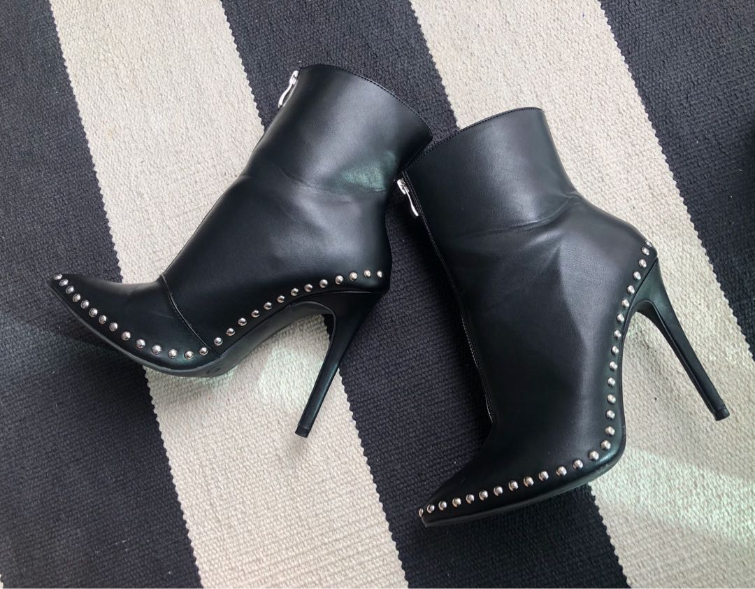 Black studded high heel zip-up boots 