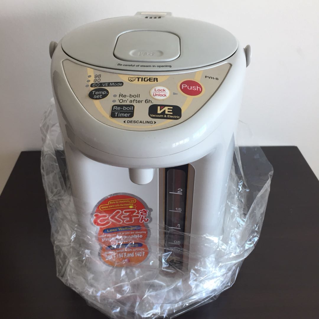 https://media.karousell.com/media/photos/products/2018/08/26/tiger_electric_hotwater_dispenser_1535255739_6a7d27bf.jpg