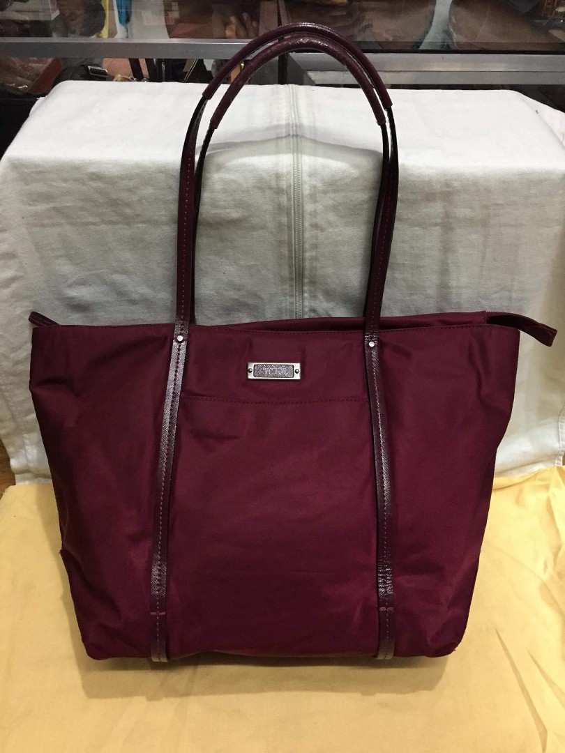 Tumi tote bag price clearance