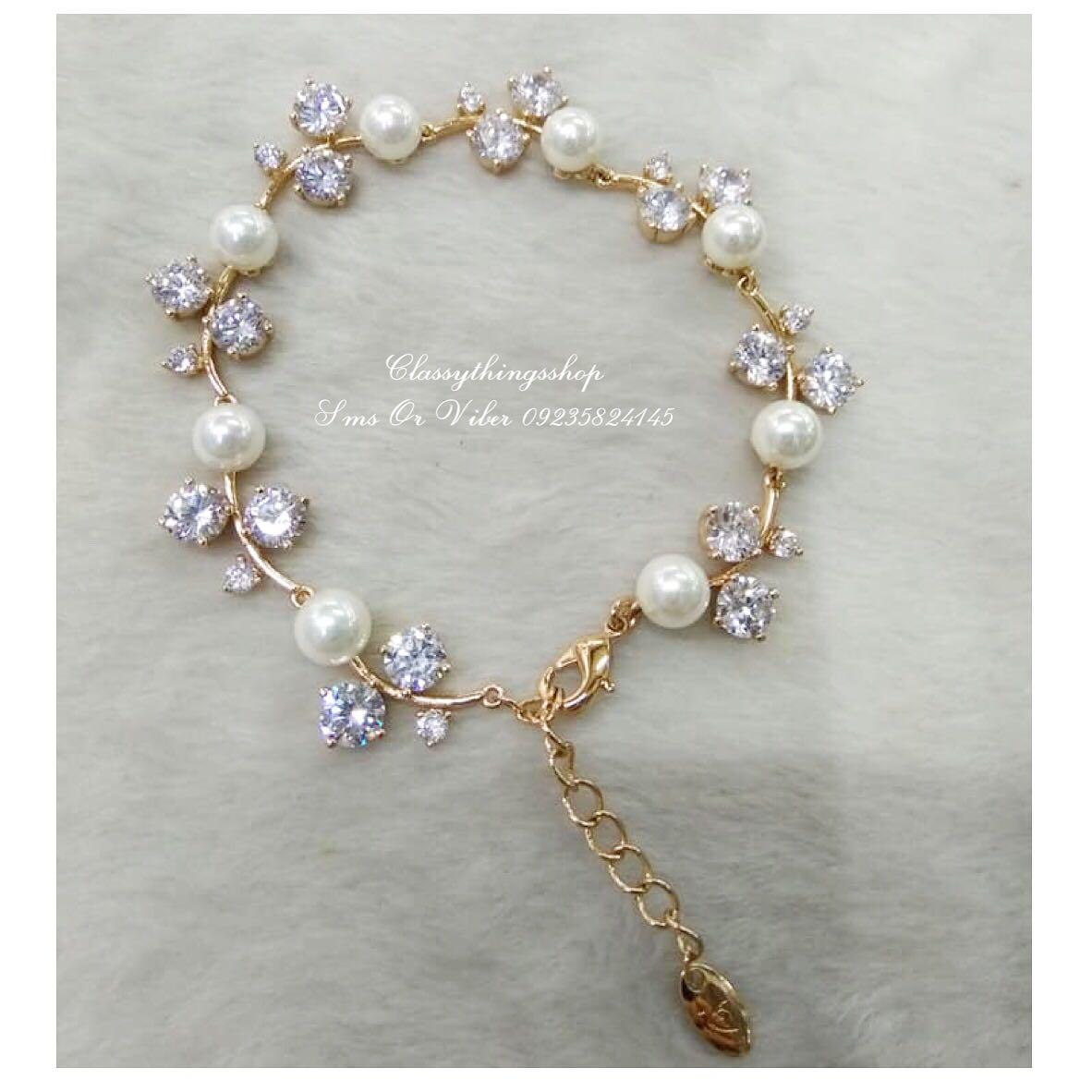 Flower Diamond Pearl Bracelet (Category: Luxury Accessories) located in Quezon City. Submitted by classythingsshop (Listing ID 186969534, Image 1). Description: Item Information: Actual Photo of item High Quality & Non Tarnish Cubic Zirconia Stones. Classy & Elegant All Items are Hypoallergenic. FOR FASTER TRANSACTION & DISCOUNTS FEEL FREE TO INQUIRE ANYTIME.. Sms Or Viber 09235824145 THANK YOU!!!.