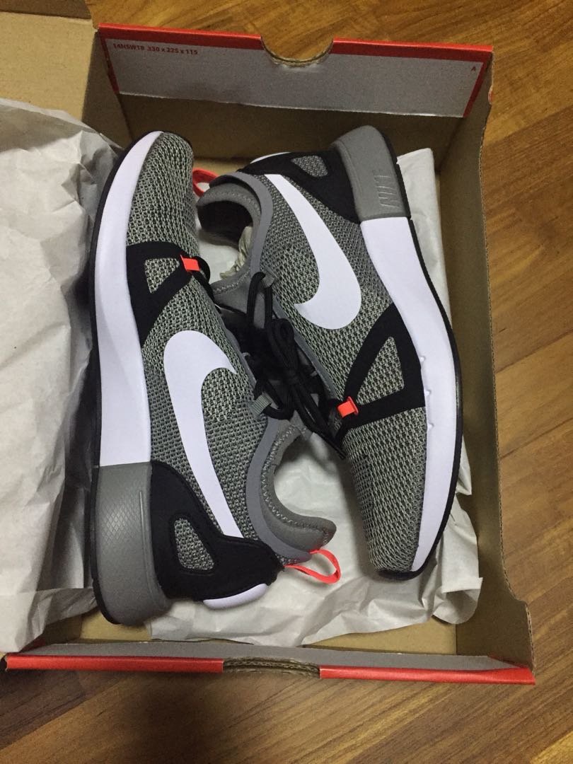 nike duel racer on feet