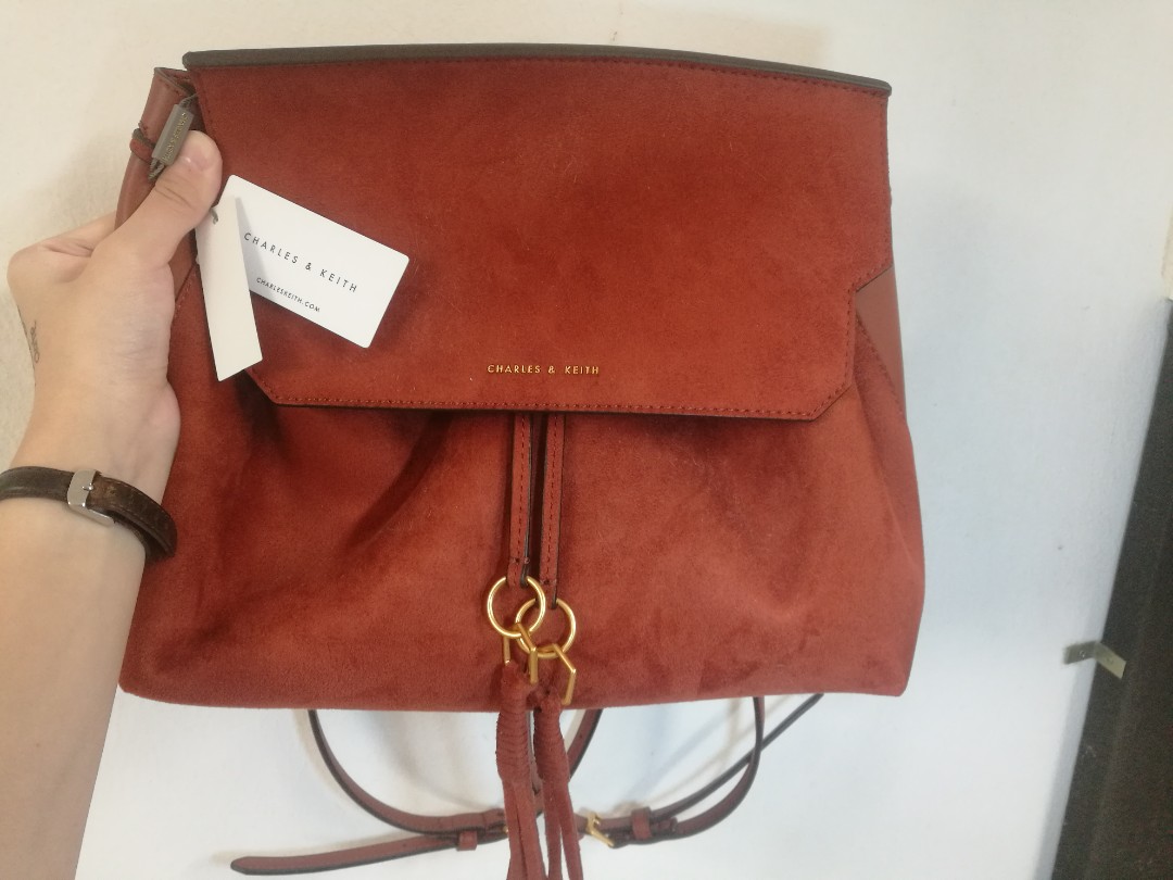Tassel detail front flap backpack clearance