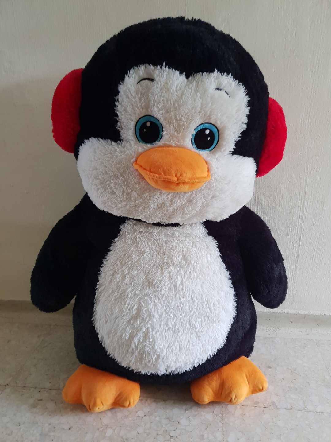 oversized penguin stuffed animal