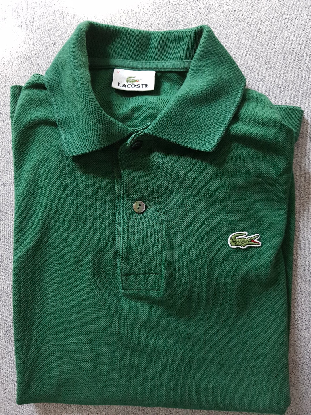 dark green lacoste polo shirt